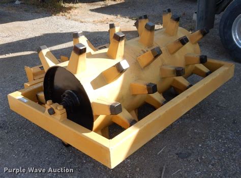 skid steer track rollers|sheepsfoot roller for skid steer.